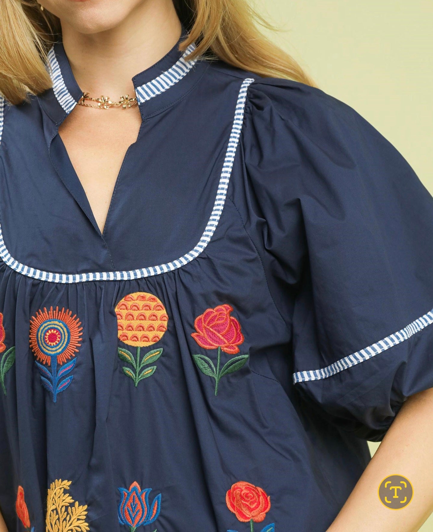 Umgee Navy Top with Striking Bright Color Embroidered Floral Detail with Puff Sleeve