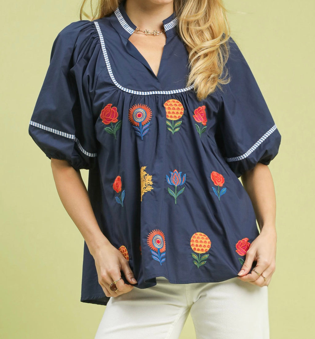 Umgee Navy Top with Striking Bright Color Embroidered Floral Detail with Puff Sleeve
