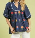 Umgee Navy Top with Striking Bright Color Embroidered Floral Detail with Puff Sleeve