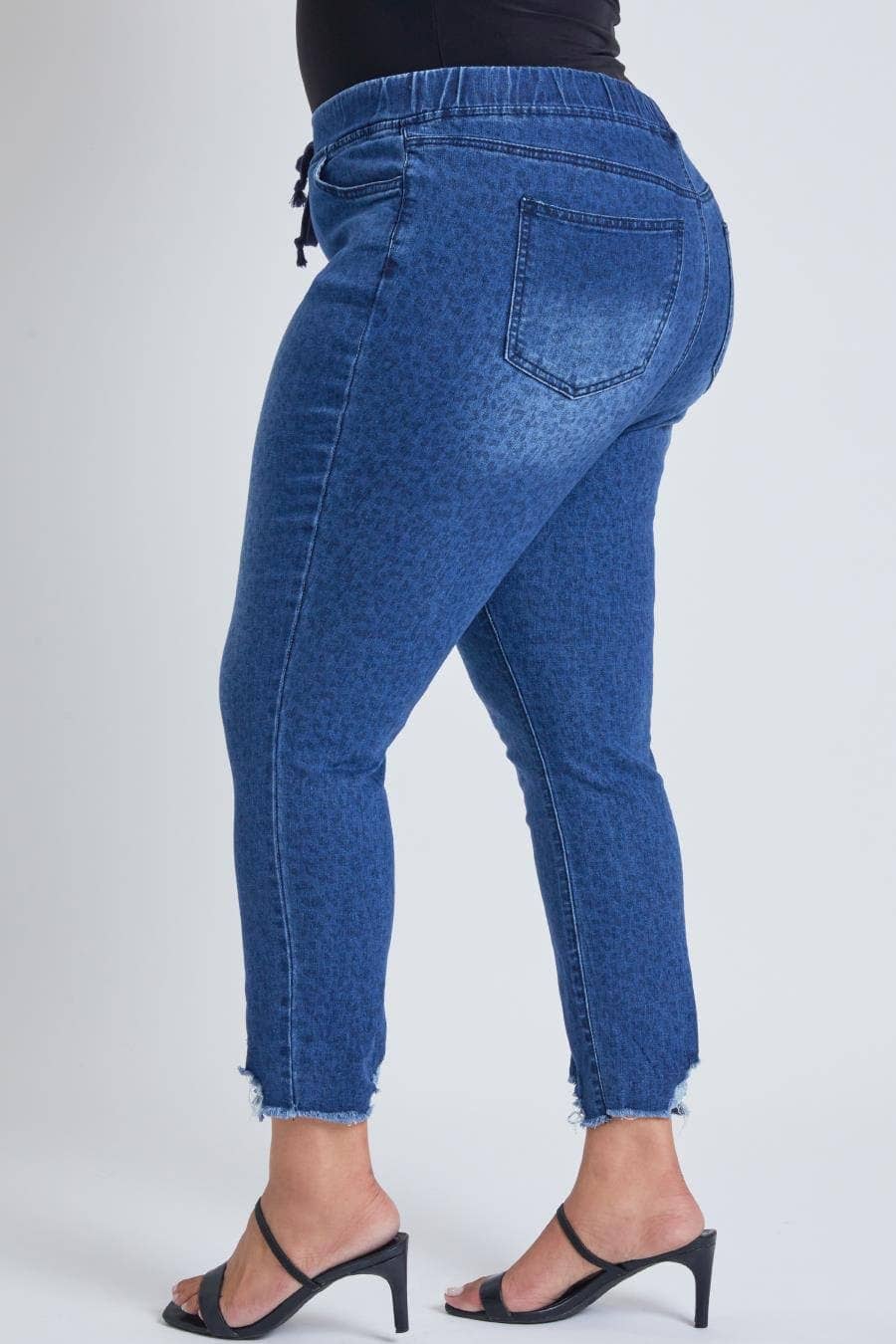 PLUS SIZE HIGH RISE ANIMAL PRINT ANKLE LENGTH FRAYED HEM DENIM JOGGER | Charlotte's Classy Closet